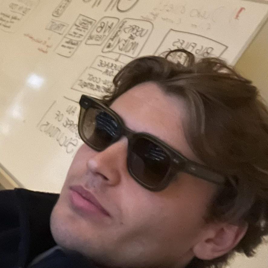 Philip Rönnmark in front of a whiteboard